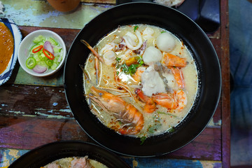 Tom Yum Kung with noodles and seafood