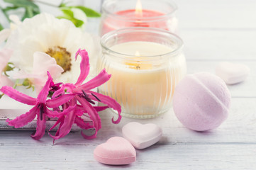 Bath bombs on old wooden background