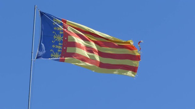 Valencia city flag at blue sky