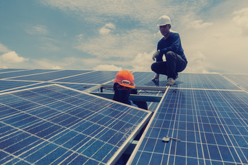 engineer and elecrician team swapping and install solar panel after solar panel voltage drop