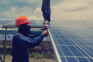 engineer and elecrician team swapping and install solar panel after solar panel voltage drop