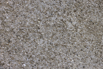 the stones on the ground and asphalt