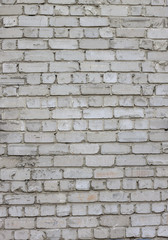 Old worn old brick wall in grunge style, The textured background. Photo pattern.