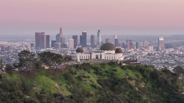 Griffith Observatory and Downtown Los Angeles. Day To Night Transition Timelapse 