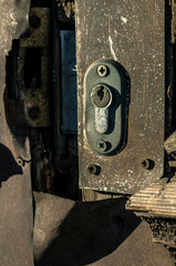 Old door keyhole. Door lock.