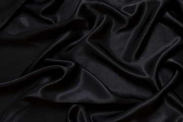 Obraz premium Black silk fabric background