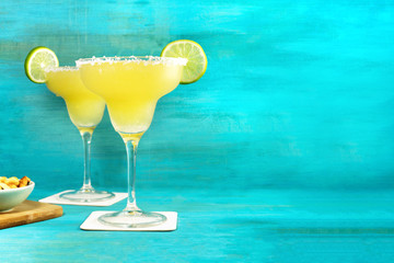 Margarita cocktail photo on vibrant background with copyspace