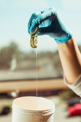 Sugar paste for depilation in the hands of a cosmetologist