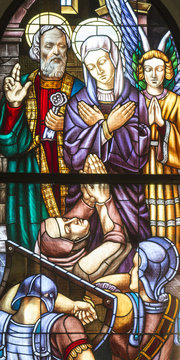 Stained Glass Window With Colored Glass Depicting The Bishop St. Ambrose Of Milan