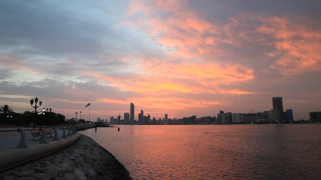 Beautiful sunrise in Abu Dhabi, United Arab Emirates. Establishing shot.