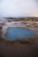 Blue lake at the geyser valley in Iceland