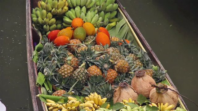 Fruits and vegetables were sold on boat the Damnoen saduak floating market is famous in Thailand