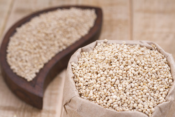 Grains of quinua on wood - Chenopodium quinoa