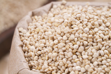 Grains of quinua on wood - Chenopodium quinoa