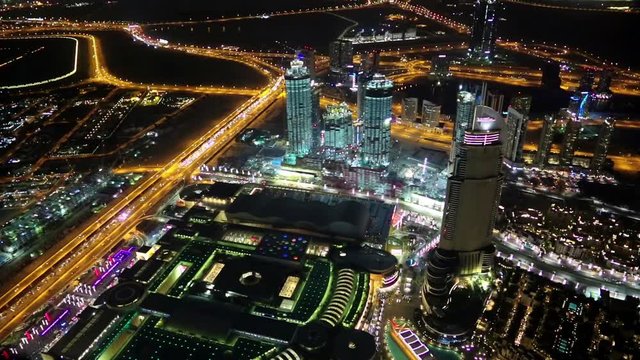 View on Dubai Mall and Address hotel from the 124th floor of Burj Khalifa skyscraper in Dubai, currently the tallest structure in the world, 829,8 m or 2,722 ft. At the top - Burj Khalifa