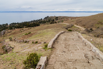 Small path on Amantani island, Titicaca lake, Peru