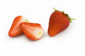 Strawberries isolated on white background. Still-life picture taken in studio with soft-box.