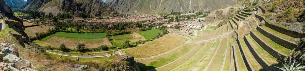Panorama of Inca agricultural terraces and village Ollantaytambo, Sacred Valley of Incas, Peru - obrazy, fototapety, plakaty