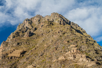 Ruins of Pinkulluna (Inca storehouses) above village Ollantaytambo, Sacred Valley of Incas, Peru