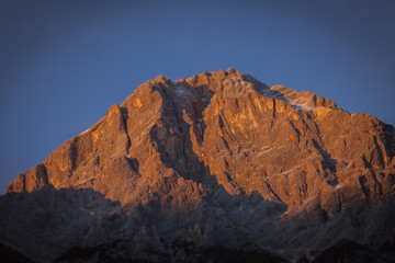 Fototapeta na wymiar Tilt shift sunset view of Antelao top, Dolomites