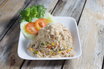 Stir fried noodles, crispy pork