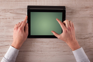 Business hands holding tablet