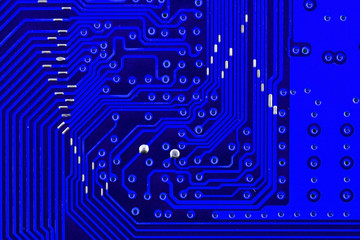 Electronic circuit board as an abstract background pattern. Macro close-up toned
