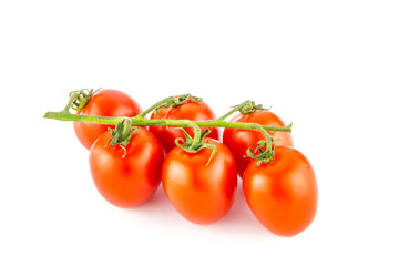 Cherry tomato bunch closeup isolated on white background