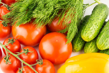 Cucumber, tomato, pepper and fennel isolated on white background close up.