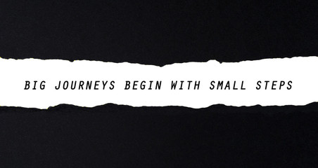 Big Journey Begin With Small Steps Word On Torn Paper.