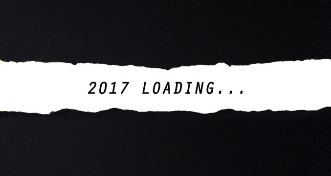 2017 Loading Word On Torn Paper.