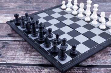 Chess On Wooden Background. 