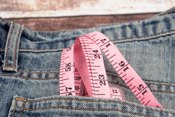 Measurement Tape with Jeans. 
