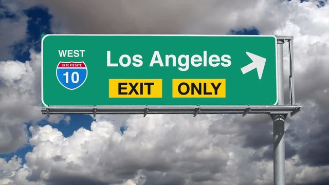 Los Angeles Interstate 10 Exit Sign with Time Lapse Clouds and Zoom