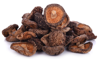 dried shiitake mushrooms isolated on a white background