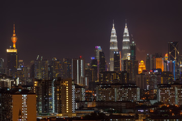 Fototapeta na wymiar KUALA LUMPUR, MALAYSIA - 24TH FEBRUARY 2017; Kuala Lumpur, the capital of Malaysia. Its modern skyline is dominated by the 451m-tall KLCC, a pair of glass-and-steel-clad skyscrapers.