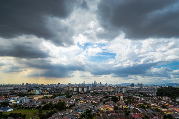 Downtown Kuala Lumpur during cloudy and sunny day