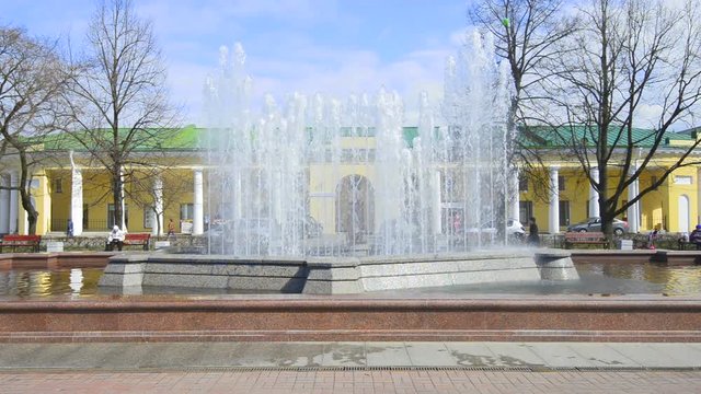 Working fountain at Gostini Dvor. Sunny may day. Kronshtadt, Russia
