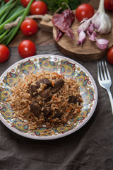  Traditional Uzbek pilaf. Rice with lamb, carrots and onions.