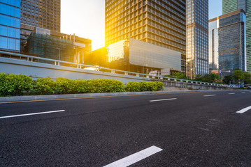 Obraz premium City Empty Road,asphalt road through modern city in China.