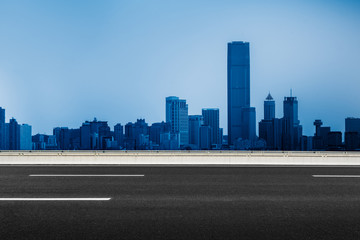 Naklejka premium City Empty Road,asphalt road through modern city in China.