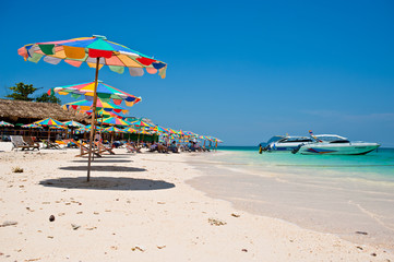 PHUKET THAILAND - MARCH 16 : Tourists Relax on the beach MARCH 16, 2010 in PHUKET THAILAND