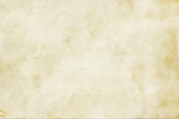 Crumpled paper texture in beige. Paper background texture