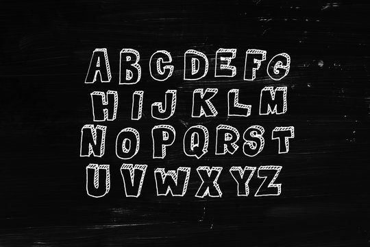 Hand drawn doodle abc on chalkboard