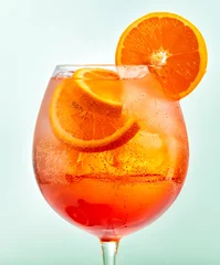 Tuinposter Glass of aperol spritz cocktail © Mara Zemgaliete