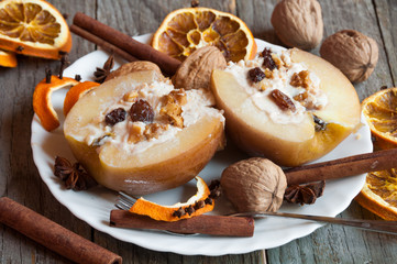 Baked apples with cinnamon and walnuts