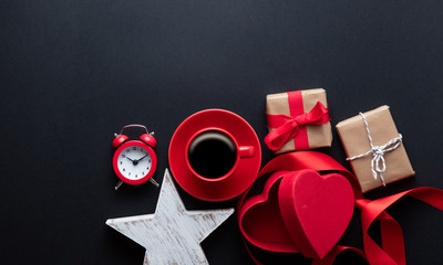 cup of coffee, gifts, box, toy, alarm clock and ribbon
