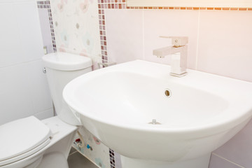 white sink ceramic in bathroom