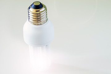 White light bulb on white background