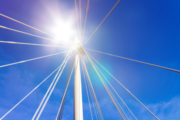 Closeup of Golden Jubilee bridge against blue sky